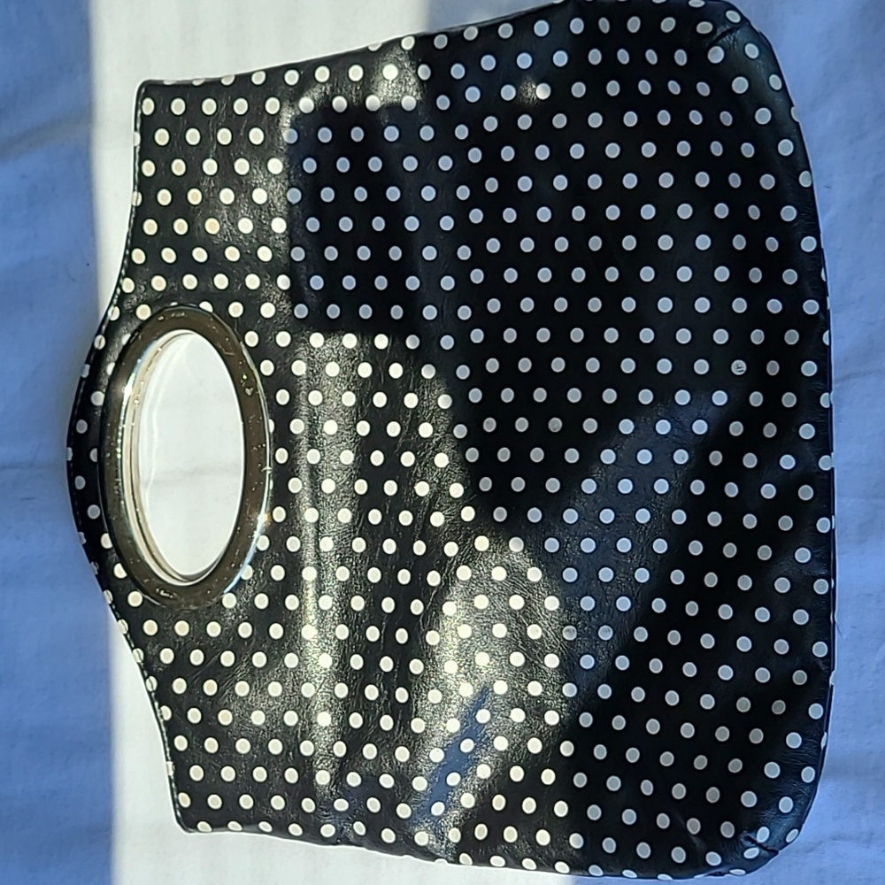 Small Polka-dot purse is nice. Polka-dot will never go away, always style